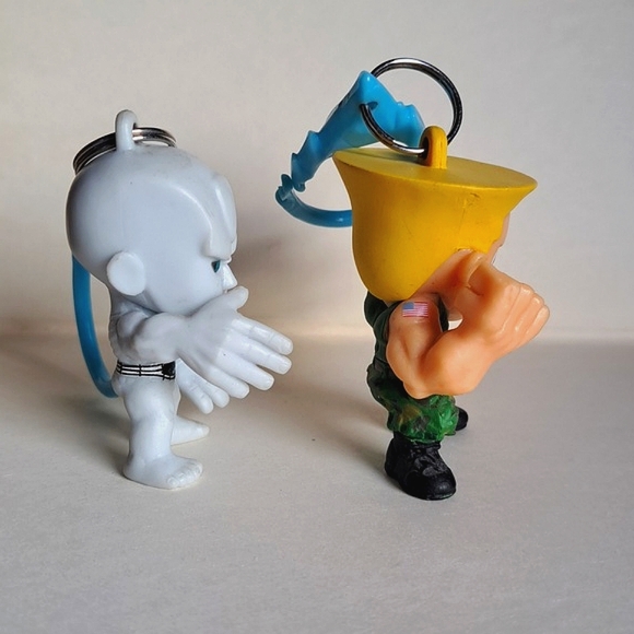 Two Capcom Street Fighter Backpack Hangers Keychain 2" Guile and Seth - Picture 2 of 7